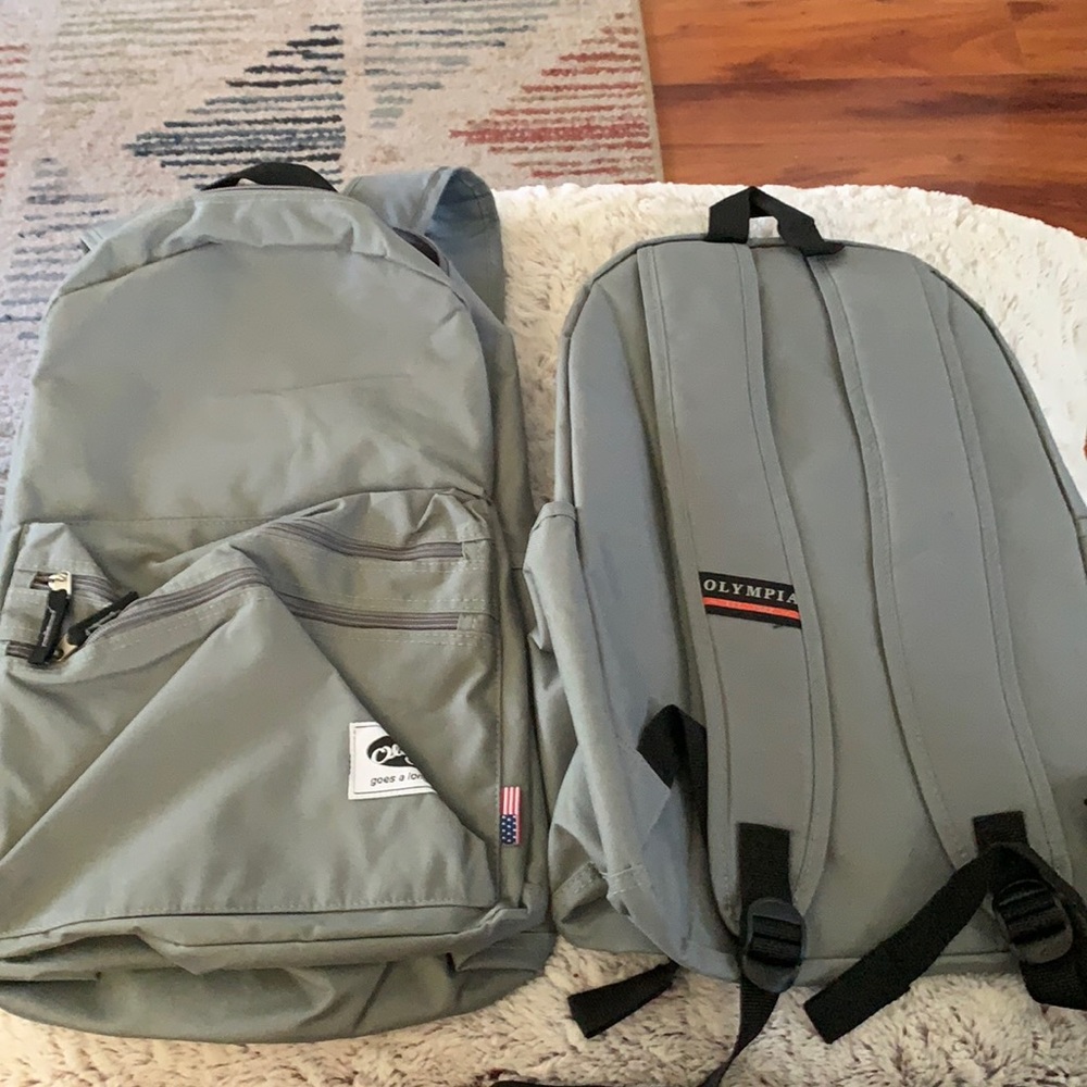 New Olympia Princeton gray backpack.  18x12.5x6. Padded laptop spot.